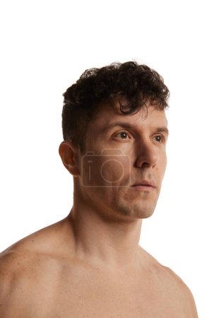 Photo for Close-up portrait of mature man posing shirtless over white studio background. Skin care cosmetics. Concept of mens health and beauty, body and skin care, hygiene, cosmetology, spa, heath. - Royalty Free Image