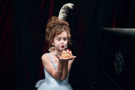 Photo for Princess. Portrait of cute little girl, child in image of medieval royal person posing with delicious cake. Concept of historical remake, comparison of eras, medieval fashion, emotions, childhood - Royalty Free Image