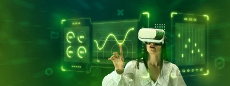 Photo for Woman, employee wearing VR glasses and working on virtual holographic computer screen. Programme development. Concept of business, innovative technologies, network, IT, virtual graphic, simulation - Royalty Free Image