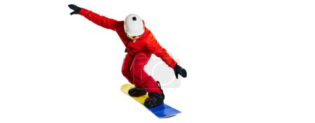 Photo for Top view. Portrait of active man, snowboarder in uniform riding on snowboard isolated over white studio background. Banner, flyer. Concept of winter sport, action, motion, hobby, leisure time - Royalty Free Image