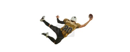Téléchargez les photos : High jump. Man, american football player in motion, training, catching ball over white studio background. Concept of sport, movement, achievements, competition, hobby. Copy space for ad - en image libre de droit