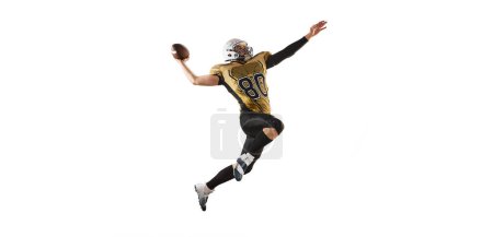Foto de Throwing ball in a jump. Man, american football player in motion, training over white studio background. Concept of sport, movement, achievements, competition, hobby. Copy space for ad - Imagen libre de derechos