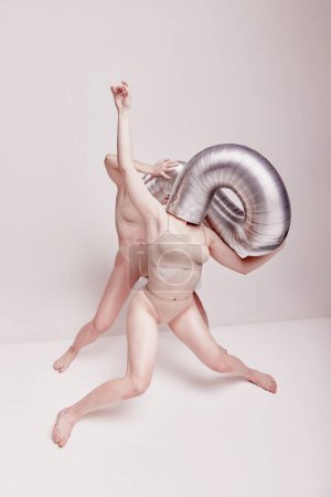 Photo for Abstract. Creative photography with two young girls posing in nude underwear over beige studio background. Concept of cringe, queer, art photography, weird people, creativity - Royalty Free Image