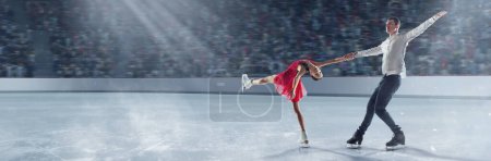 Photo for Two professional sportsmen, man and woman, figure skaters showing graceful performance on 3D arena, ice rink. Concept of sport, achievements, championship, talent, beauty. Duo figure skating - Royalty Free Image