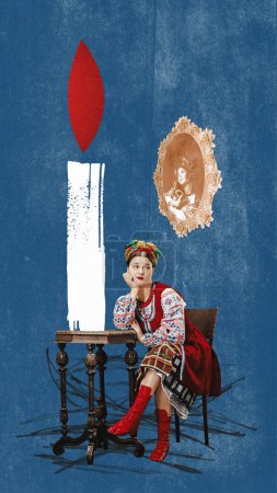 Téléchargez les photos : Contemporary art collage. Conceptual design. Beautiful young ukrainian girl in national clothes sitting near candle in dark room. Dreams. Concept of culture, ukrainian aesthetics, art, freedom - en image libre de droit