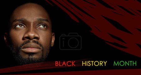 Photo for Racial equality. African-american man black background. Black History Month. Changing history. Banner, poster. Concept of human rights, freedom, history, discrimination and activism. - Royalty Free Image