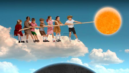 Photo for Happy playful little kids, boys and girls standing on cloud and playing together, pulling sun with rope. Contemporary conceptual art collage. Surrealism. Concept of childhood, dreams, fantasy - Royalty Free Image