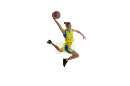 Photo for Winning goal. Young concentrated girl, female basketball player in motion, training, playing against white studio background. Isometric view. Concept of professional sport, healthy lifestyle, action - Royalty Free Image