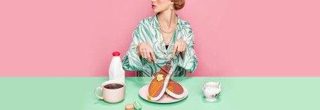 Téléchargez les photos : Image recadrée d'une fille élégante mangeant des baskets surréalistes gaufres avec du miel et du beurre pour le petit déjeuner sur fond de studio rose. Photographie pop art culinaire. Concept de style rétro, vision créative - en image libre de droit