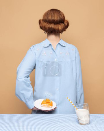 Photo for Creative image of young girl with stylish hairdo holding birthday cake with candles. Surrealism. Backwards stand. Hiding face. Food pop art photography. Concept of retro style, creative vision, party - Royalty Free Image
