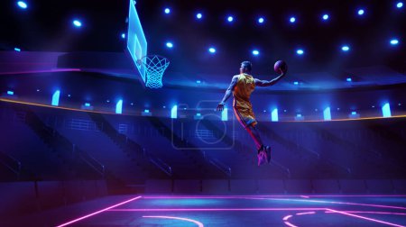 Photo for Scoring winning goal. Young man, professional basketball player in yellow uniform jumping, throwing ball into basket on 3D stadium with flashlights. Concept of sport, competition, action and motion - Royalty Free Image