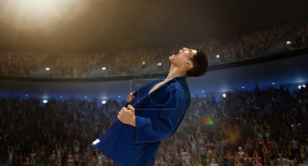 Photo for Young muscular man, professional martial arts sportsman, karateka in kimono standing on 3D field with spotlights, emotionally cheating. WInner. Concept of sport, competition, game, emotions - Royalty Free Image