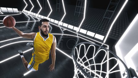 Photo for Dynamic image of young man, basketball player in yellow uniform, throwing ball into basket in jump at 3D basketball court. Concept of professional sport, competition, action, competition, game - Royalty Free Image