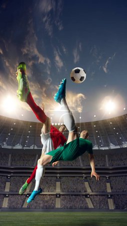 Photo for Dynamic image of professional football, soccer athletes during game, watch at 3D openair stadium. Active game, winning goal. Concept of professional sport, championship, game, achievement - Royalty Free Image