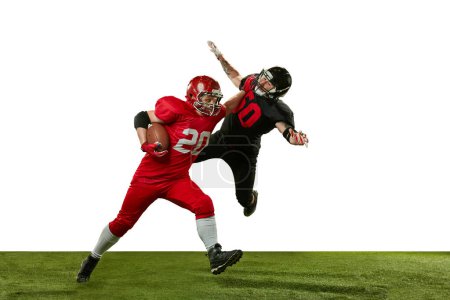 Photo for Men, american football players in motions, playing, training against white background. Game preparation. Concept of professional sport, action, lifestyle, competition and hobby, training, ad - Royalty Free Image