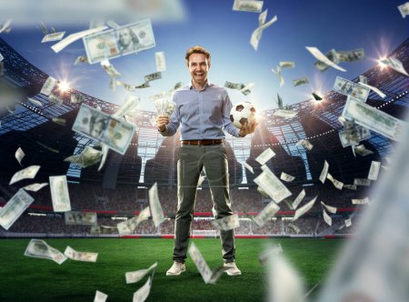 Photo for Successful lucky businessman standing on 3D arena of football playground with many money flying around. Celebrating win. Concept of sport, fan, betting, finances, gambling, bookmaker, emotions - Royalty Free Image