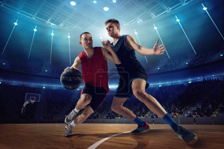 Photo for Tense game. Competitive young men, basketball players in motion during match, game playing at 3D arena with flashlights. Concept of professional sport, competition, action, hobby, game. - Royalty Free Image