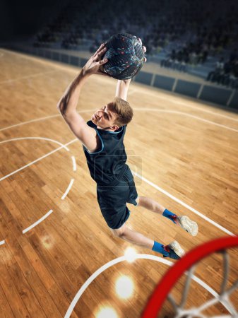 Photo for Top view image of young man, basketball player in motion during match, jumping, throwing ball into basket. 3D stadium. Scoring goal. Concept of professional sport, competition, action, hobby, game. - Royalty Free Image