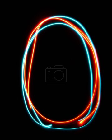 Photo for Letter O of the alphabet made from neon sign. The blue red light image, long exposure with colored fairy lights, against a black background. Concept of design - Royalty Free Image