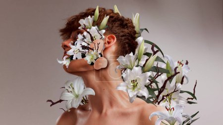 Photo for Feelings and passion. Young guy with flowers around his body. Surrealism and fantasy. Contemporary art collage. Concept of floral aesthetics, natural beauty, inspiration, abstract art, ad - Royalty Free Image