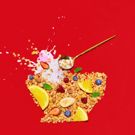 Photo for Ingredients for healthy breakfast. Muesli, cereal with fresh berries and spoon of milk in shape of bowl against red background. Concept of healthy food, nutrition, pop art. Poster. Copy space for ad - Royalty Free Image