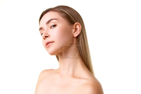 Photo for Perfect face shape. Beautiful young girl with spotless, clear face standing isolated over white studio background. Concept of natural beauty, skincare, cosmetics and cosmetology - Royalty Free Image