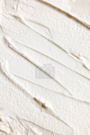 Photo for Close-up of organic, homemade butter with textured waves on it. Dairy products. Concept of food, breakfast, healthy eating and snacks, organic, homemade products - Royalty Free Image