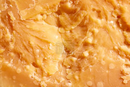 Photo for Close-up image, texture of hard cheese, Parmesan. Traditional taste of Italian cheese. Slices. Delicious. Concept of food, taste, art of organic products, healthy, natural food. - Royalty Free Image