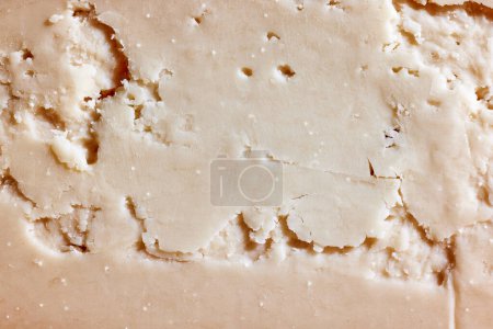 Photo for Texture of delicious, organic, natural hard cheese. Sliced. Wallpaper, background. Concept of food, taste, art of organic products, healthy and natural food. - Royalty Free Image