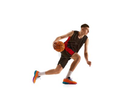 Photo for Young man, athlete in motion, basketball player during game, practicing isolated over white background. Concept of professional sport, competition, match, championship, health, action. Ad - Royalty Free Image