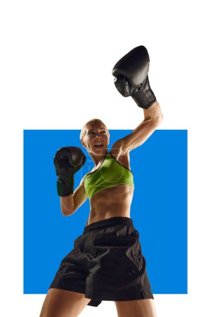 Photo for Young muscular woman with fit strong body, boxing athlete in motion, practicing over white background with blue element. Concept of sport, active and healthy lifestyle, strength, body care. Poster - Royalty Free Image