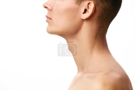 Photo for Cropped image of young mans face with neck against white studio background. Face shape correction, double chin. Concept of male beauty, skin care, spa, cosmetology, mens health - Royalty Free Image