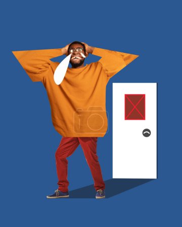Photo for African-American man crying neat to closed door. Racism problems. Conceptual design. Contemporary artwork. Concept of social influence, stereotypes, human equality, discrimination and tolerance - Royalty Free Image