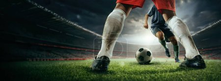 Photo for Cropped image of male legs in dirty uniform, football players during game, competing on sport field, 3d outdoor arena. Concept of sport, game, competition, championship. 3D render - Royalty Free Image