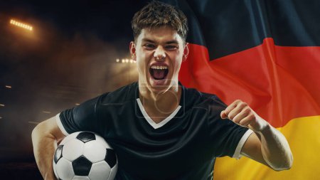 Photo for Emotional young guy, soccer player shouting, expressing winning emotions, representing team of Germany. Champion. Concept of live sport event, championship, match and tournament - Royalty Free Image