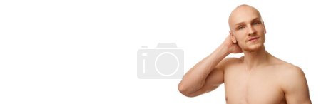 Photo for Young bald muscular man with shirtless body, spotless face standing isolated white studio background. Concept of skin care, male beauty and cosmetics, youth. Banner. Empty space to insert text, ad - Royalty Free Image