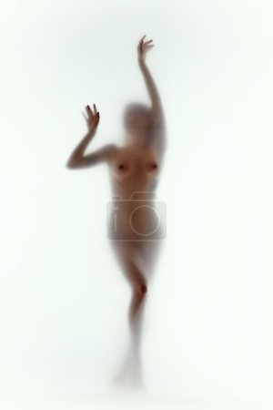 Photo for Blurred silhouette of tender female body. Promotional material for womens health clinic, focusing on body positivity. Concept of body aesthetics, femininity, beauty, health, art - Royalty Free Image