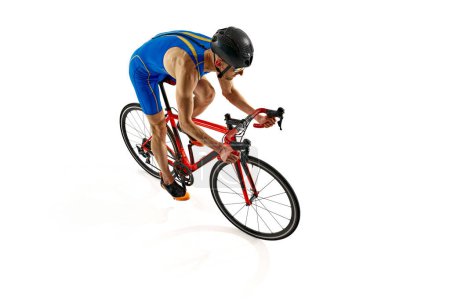 Photo for Top view image of man, athlete in uniform, helmet and goggles riding bicycle isolated on white studio background. Concept of sport, active and healthy lifestyle, speed, endurance, hobby - Royalty Free Image
