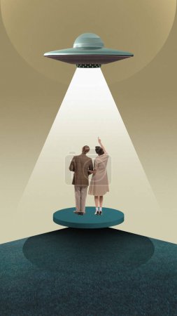 Photo for Couple looking at UFO with beam of light on circular platform, beige background. Contact with extraterrestrial beings. Contemporary art collage. Concept of surrealism, creative vision. Poster - Royalty Free Image