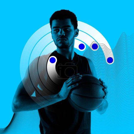 Photo for Concentrated young man, basketball player standing with ball against blue background with health tracking graphics. Monochrome. Concept of sport, active and heathy lifestyle, training - Royalty Free Image