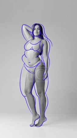 Photo for Drawings of overweight lines around body. Weight loss. Full-length image of slim young woman with overlined body in underwear. Concept of body and health care, wellness, body-positivity, diet, sport - Royalty Free Image