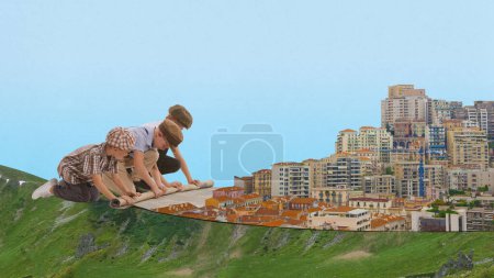 Photo for Little boys, friends, chidden rolling up carpet with urban background. Travelling. Outdoor game. Contemporary art collage. Concept of architecture, retro and vintage, childhood, fantasy - Royalty Free Image