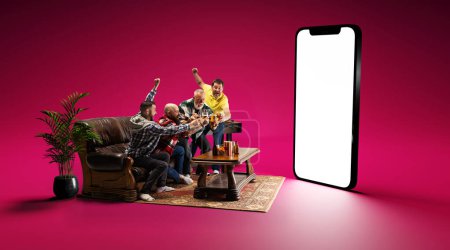 Photo for Cheers. Friends, men gathering at home to watch online football match translations, clinking beer glasses and celebrating winning goal. 3D model of screen. Sport, tournament, championship concept - Royalty Free Image