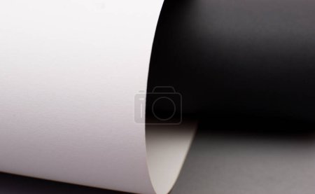 Curved abstract black, white and gray background