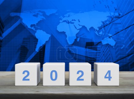 Photo for 2024 letter on white block cubes on wooden table over world map, modern office city tower and skyscraper, Happy new year 2024 cover concept, Elements of this image furnished by NASA - Royalty Free Image