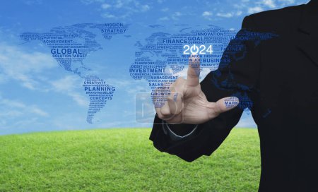 Photo for Businessman pressing 2024 start up business icon with global words world map over green grass field with blue sky, Happy new year 2024 global business start up concept, Elements of this image furnished by NASA - Royalty Free Image