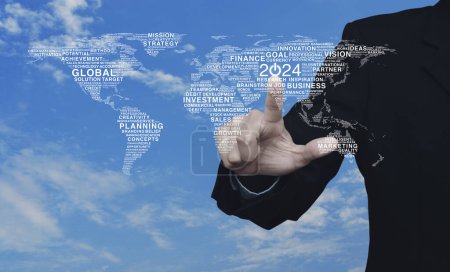 Photo for Businessman pressing 2024 start up business icon with global words world map over blue sky with white clouds, Happy new year 2024 global business start up concept, Elements of this image furnished by NASA - Royalty Free Image