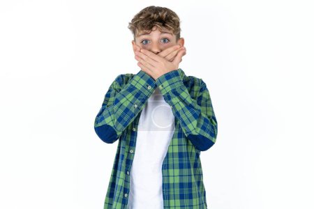 Photo for Handsome caucasian teenager boy on white studio background shocked covering mouth with hands for mistake. Secret concept. - Royalty Free Image
