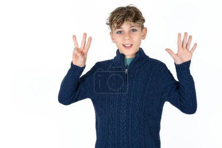 Photo for Handsome caucasian teenager boy on white studio background showing and pointing up with fingers number eight while smiling confident and happy. - Royalty Free Image