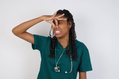 Photo for Beautiful young african american doctor woman wearing medical uniform isolated background looking at the camera smiling with open arms for hug. Cheerful expression embracing happiness. - Royalty Free Image